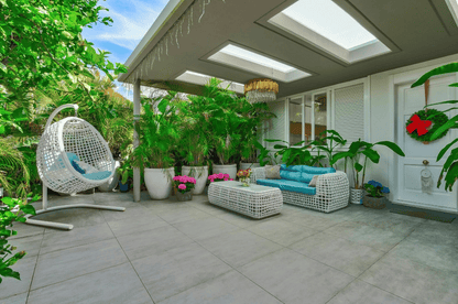 Torviscas_Alto_Luxury_4_bedroom_villa_tenerife_outside_armchair_sofa_azure_garden