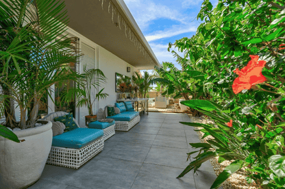 Torviscas_Alto_Luxury_4_bedroom_villa_tenerife_outside_azure_armchair_garden